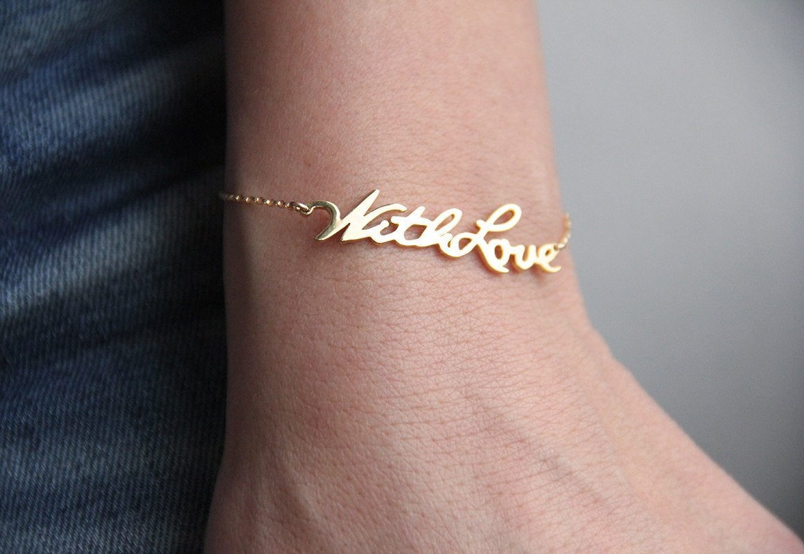 Gold chain bracelet with personalized signature