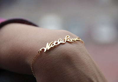 Gold chain bracelet with personalized signature