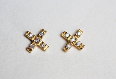 Round white diamond cross stud earrings