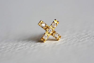 Round white diamond cross stud earrings