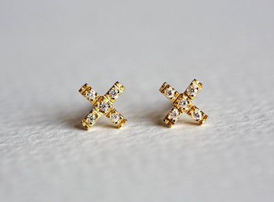 Round white diamond cross stud earrings