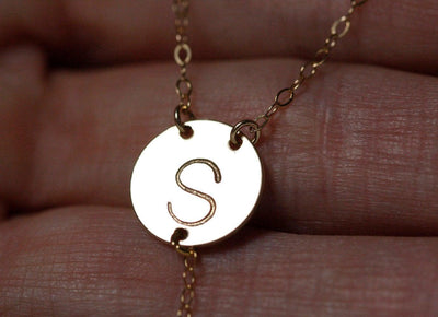 Gold lariat necklace with initial