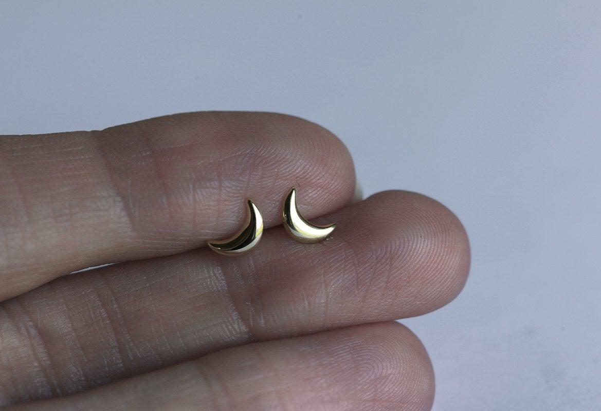 Gold crescent moon stud earrings