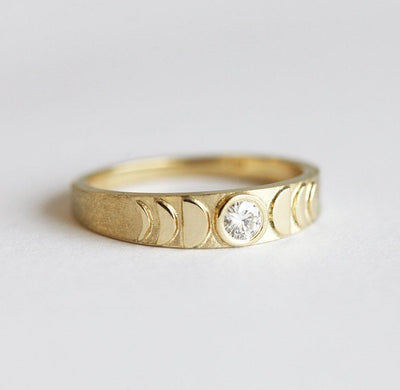Round White Diamond Band with moon phase textures on ring's surface