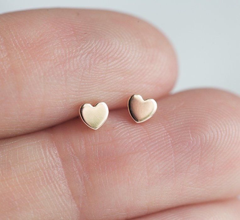 Heart shaped gold stud earrings