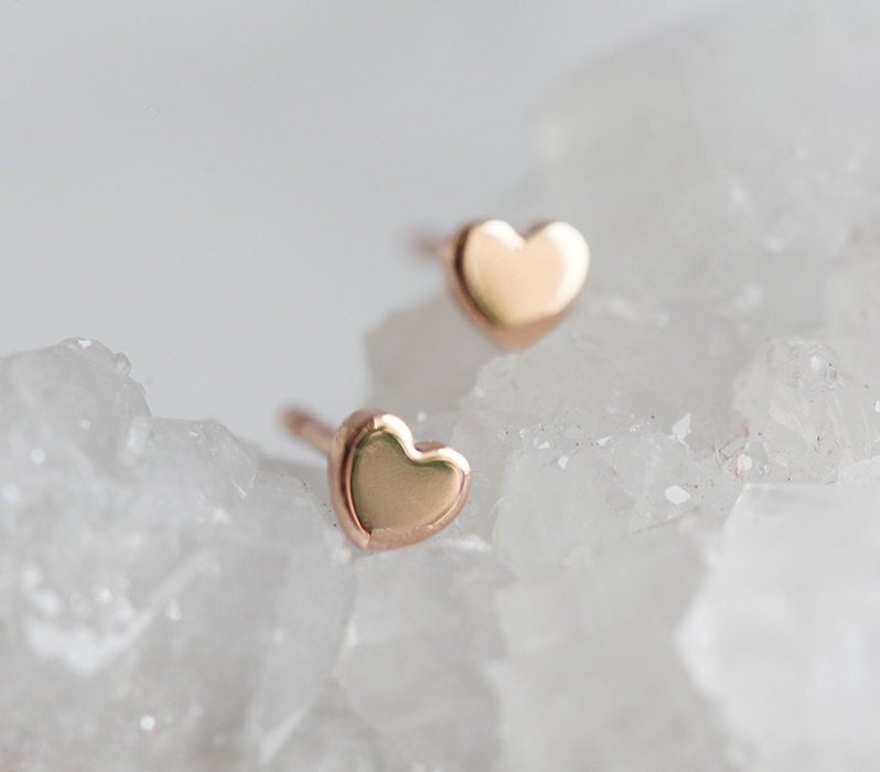 Heart shaped gold stud earrings