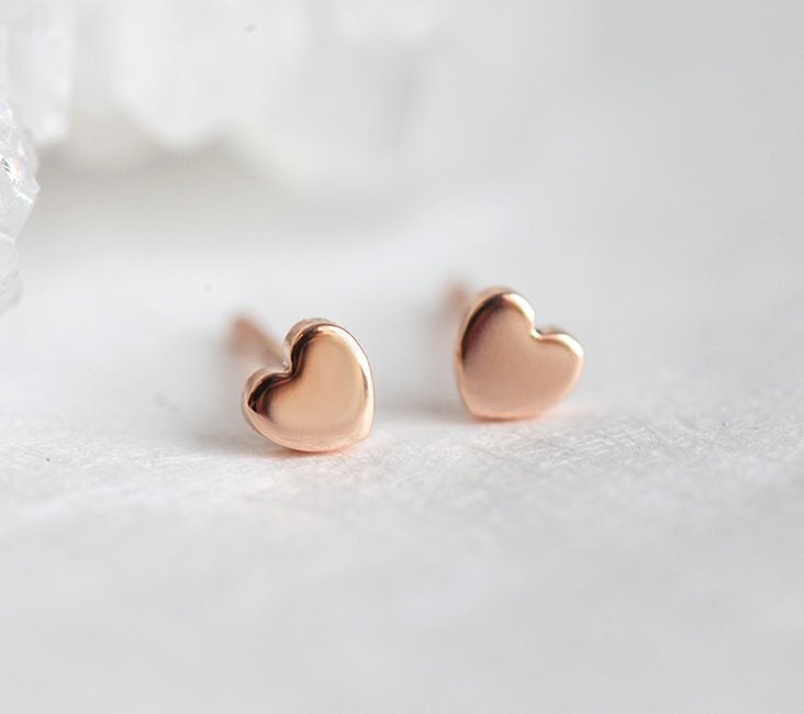 Heart shaped gold stud earrings