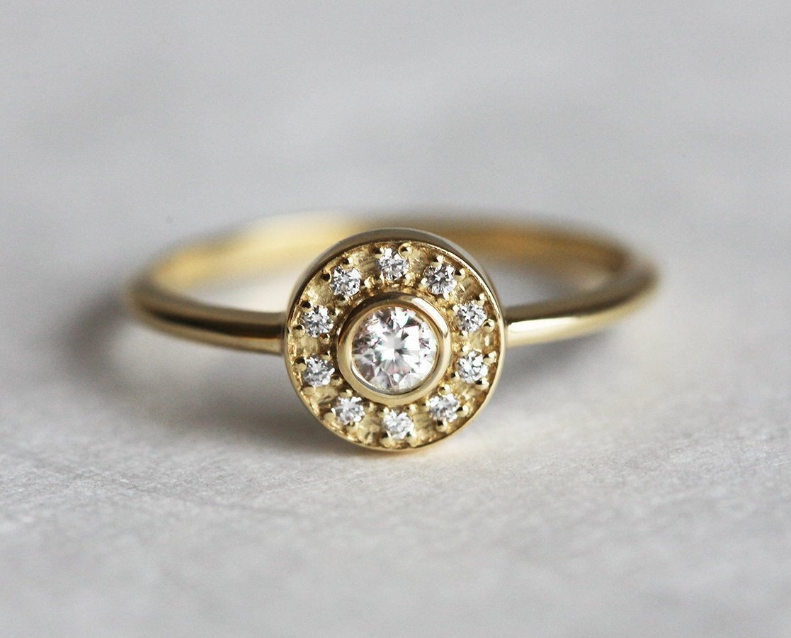 Round peridot diamond engagement ring with diamond halo