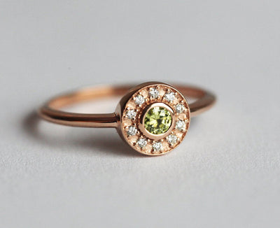 Round peridot diamond engagement ring with diamond halo