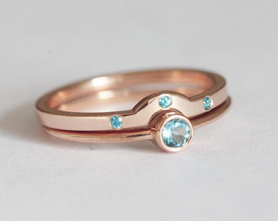 Layered round blue topaz solitaire ring set