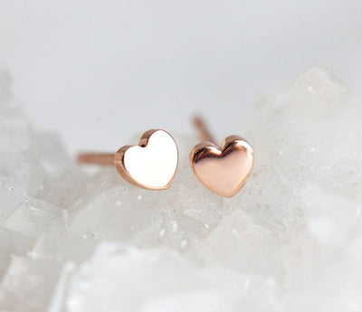 Heart shaped gold stud earrings