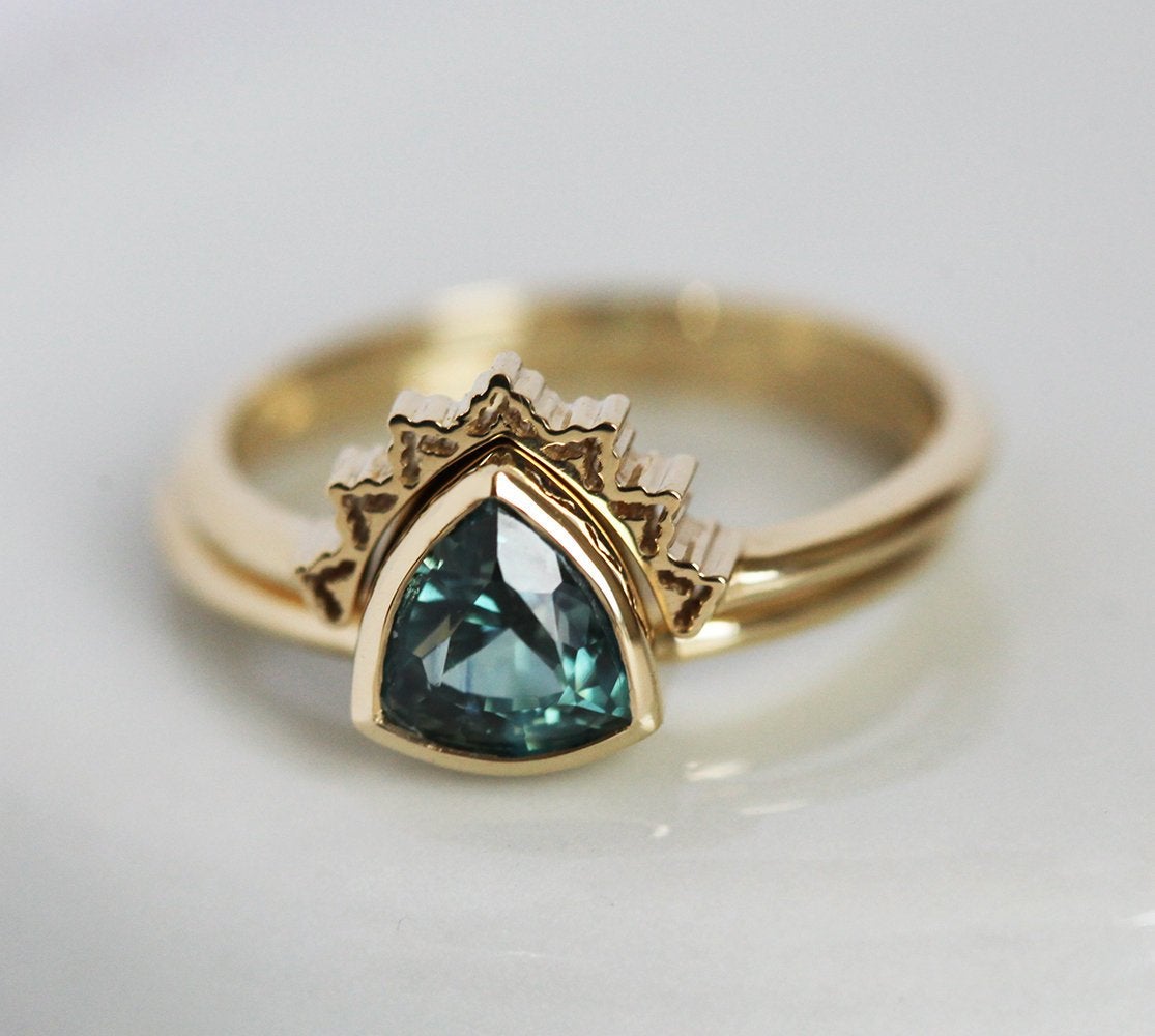 Trillion-cut green blue sapphire ring with gold lace band