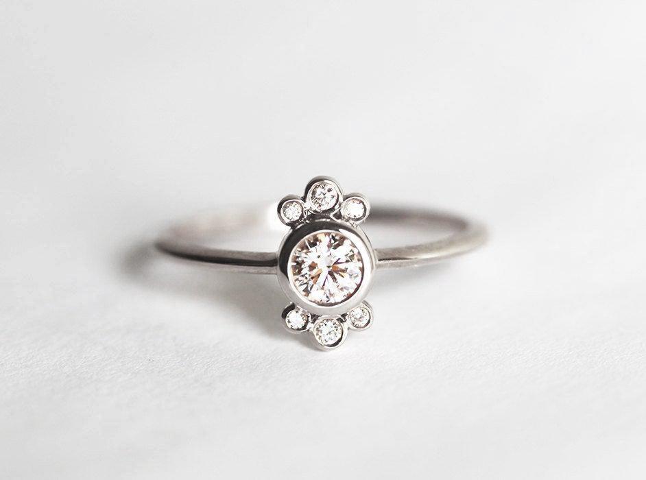 Round White Diamond with Side Round Diamonds Engagement Ring