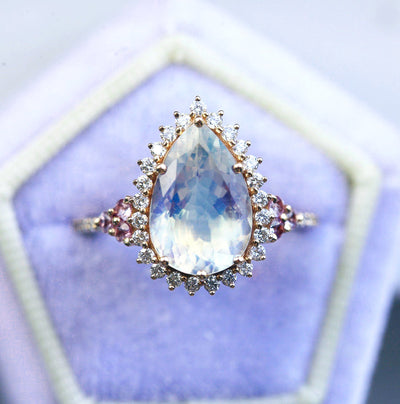 Pear Moonstone Halo Engagement Ring with White Diamonds and Sapphire