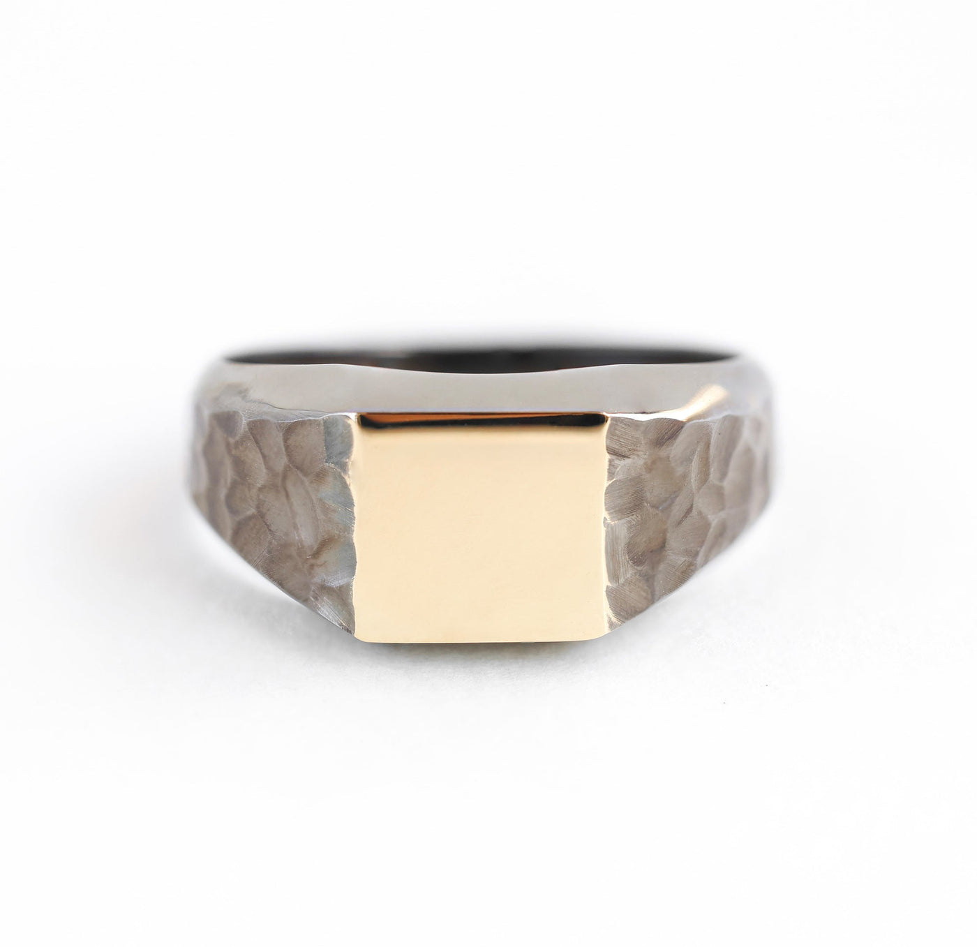 Hammered men's signet ring in gold or platinum, featuring a textured design. Perfect anniversary ring for him.