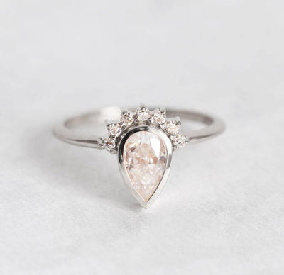 Pear Cut White Diamond Ring With Diamond Crown