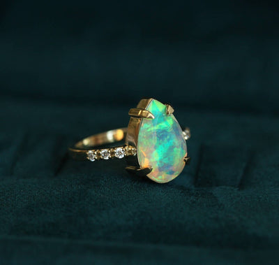 Pear White Opal Ring with Half Eternity Pave Diamonds