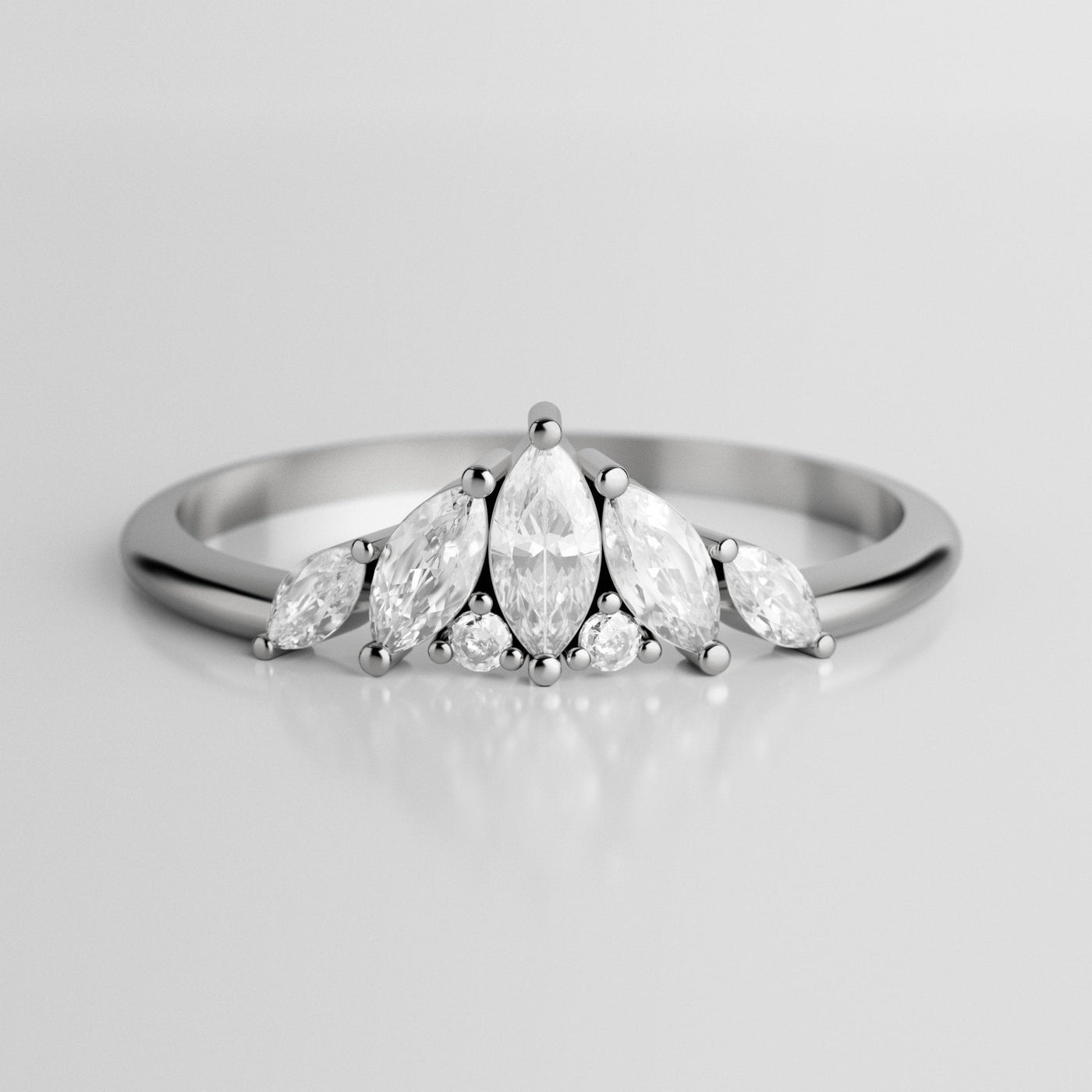 Array of Marquise-Cut White Diamonds resembling an iceberg with smaller White Round Diamonds on an Art Deco inspired Gold Ring