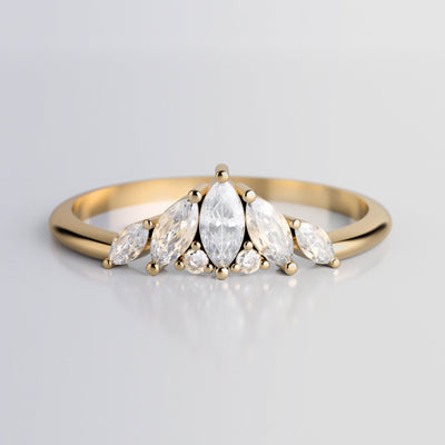 Array of Marquise-Cut White Diamonds resembling an iceberg with smaller White Round Diamonds on an Art Deco inspired Gold Ring