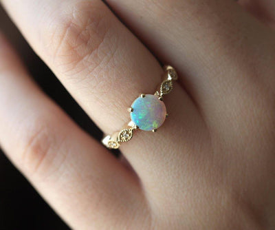 Round White Opal Ring with Pave Style Band Filled With Round White Diamonds
