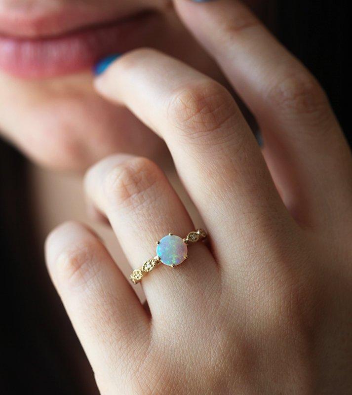 Round White Opal Ring with Pave Style Band Filled With Round White Diamonds