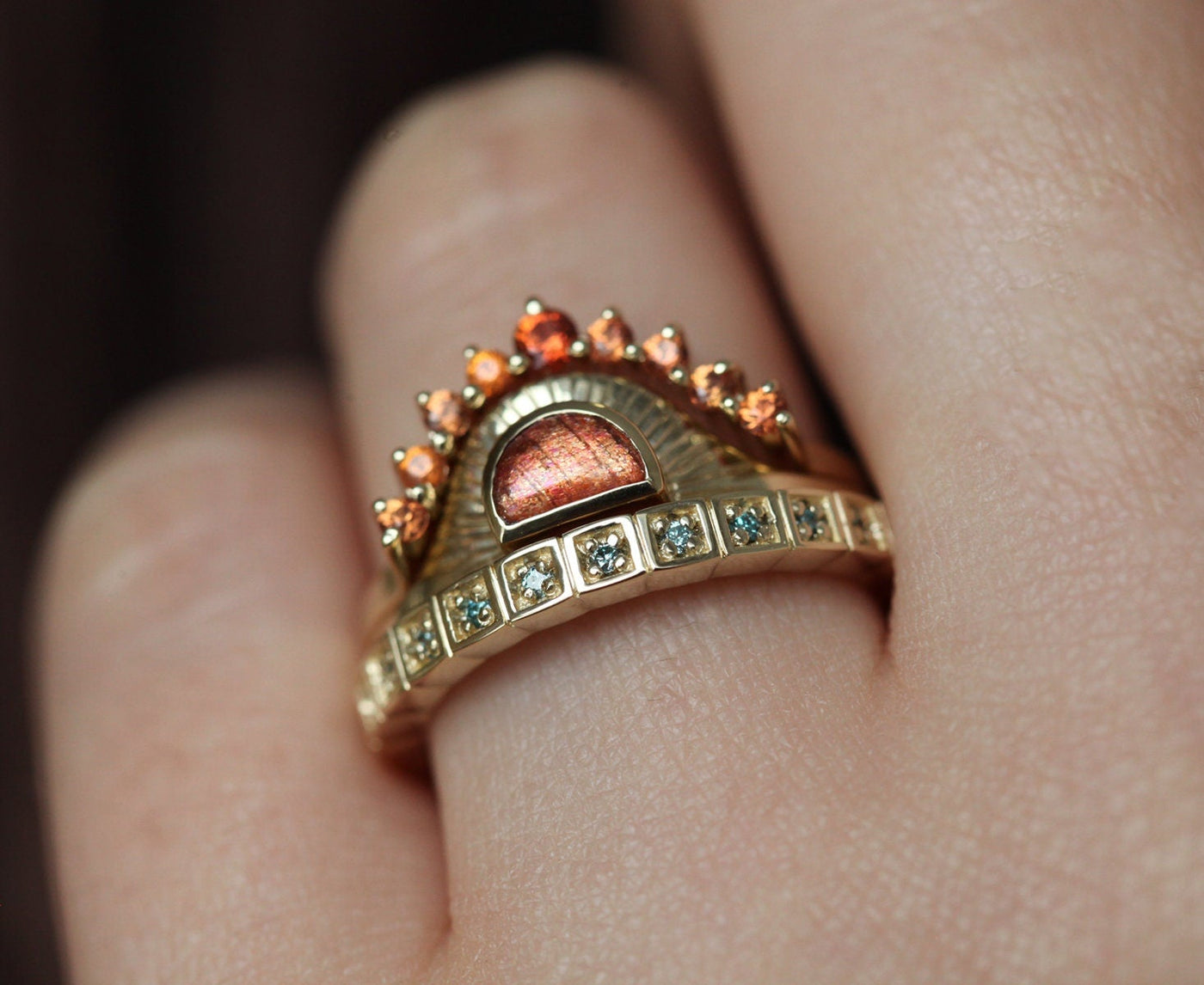 Three-Ring Half Moon Sunstone Set with Round Sapphire and Emeralds