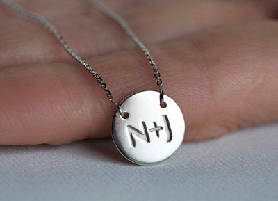 Gold necklace with initial disc