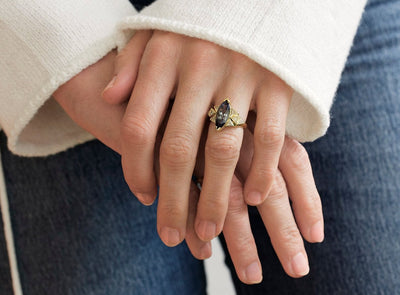 Bicolor Marquise-Cut Tanzanite Cluster Ring with Trillion-Cut White Diamonds