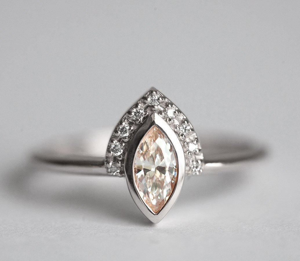 Marquise-Cut White Diamond Halo Ring with Side White Diamonds