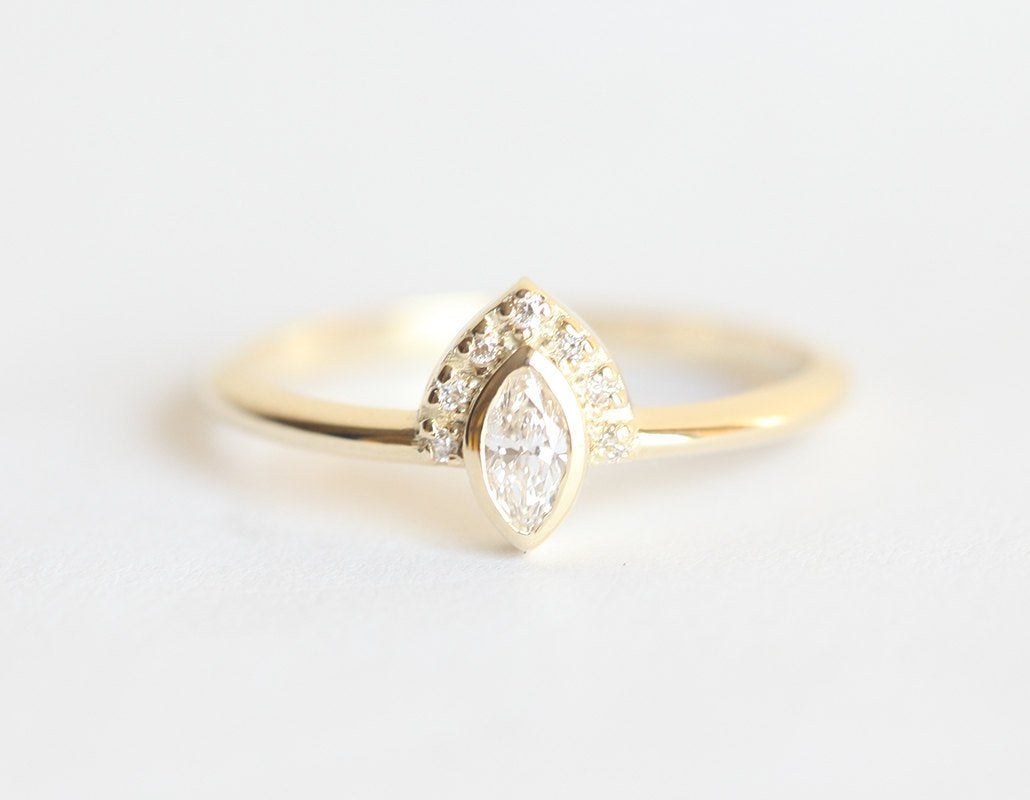 Marquise-Cut White Diamond Halo Engagement Ring with Side Pave Diamonds