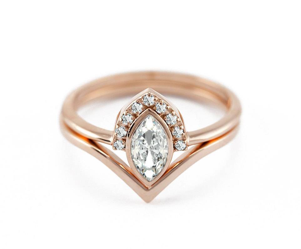 Elegant Marquise-Cut White Diamond Halo Ring with Side White Diamonds and matching Chevron Band