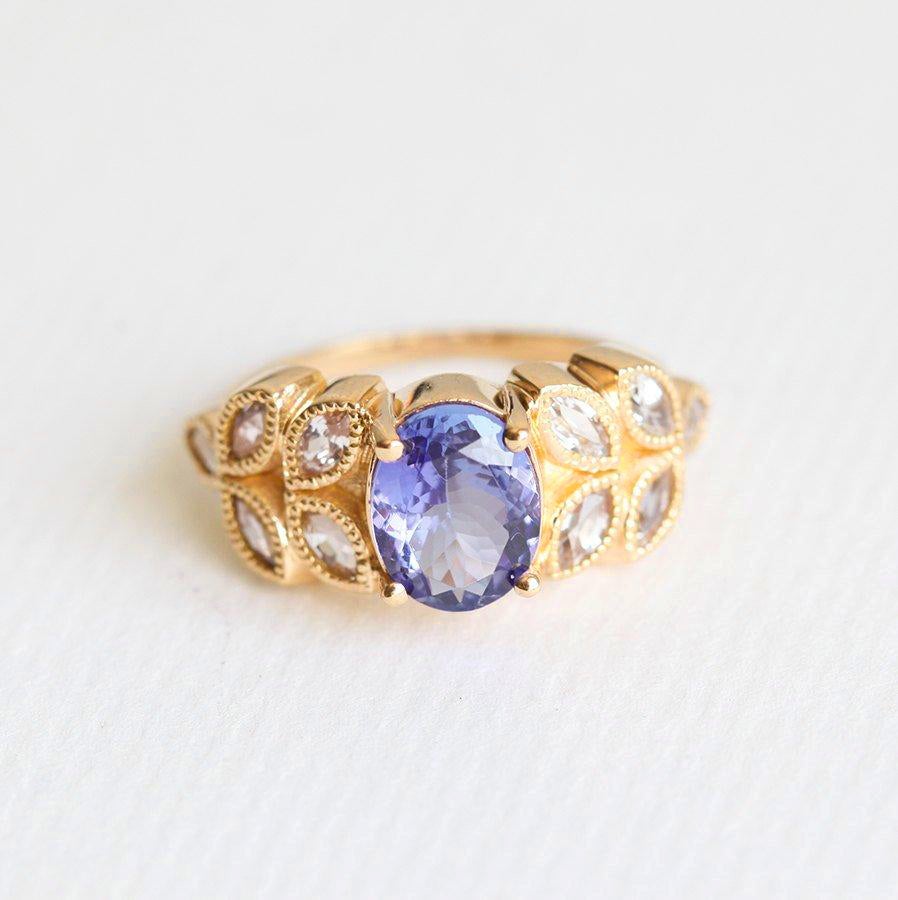 Vintage Design Violet Blue Oval Tanzanite Ring with Marquise-Cut White Diamonds