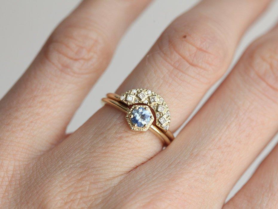 Round light blue solitaire sapphire ring