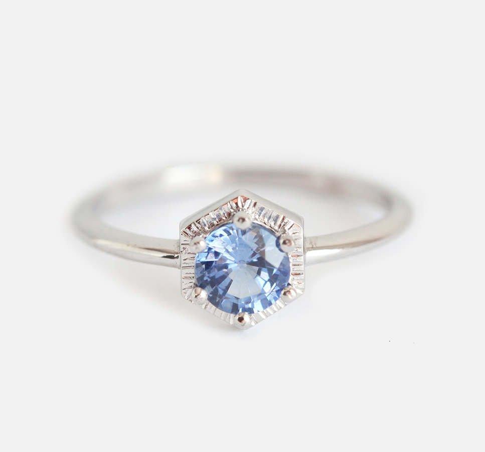 Round light blue solitaire sapphire ring