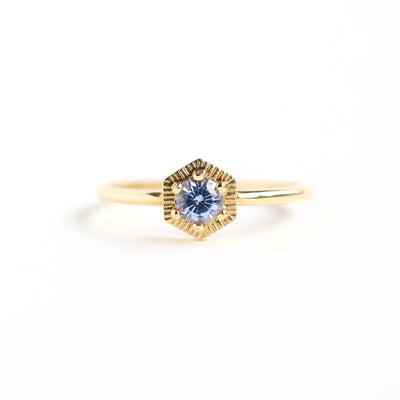 Round light blue solitaire sapphire ring