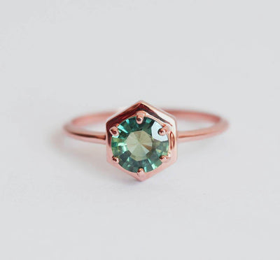 Round teal blue solitaire sapphire ring