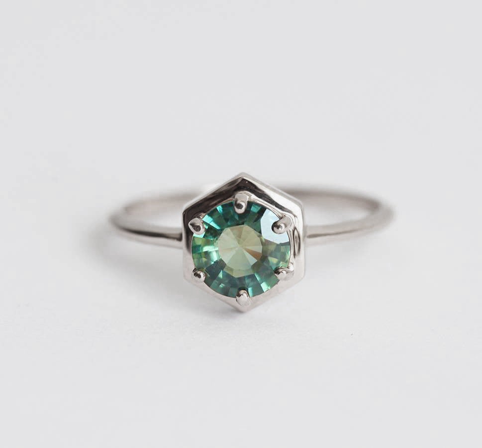 Round teal blue solitaire sapphire ring