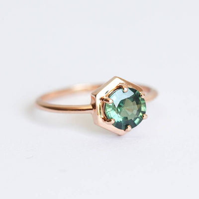 Round teal blue solitaire sapphire ring