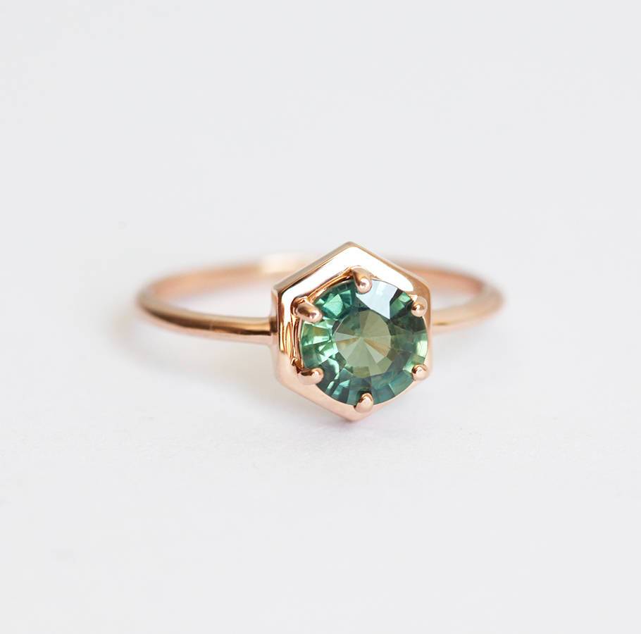 Round teal blue solitaire sapphire ring