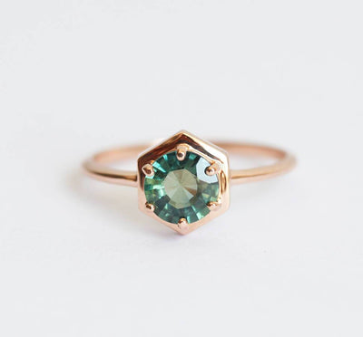 Round teal blue solitaire sapphire ring