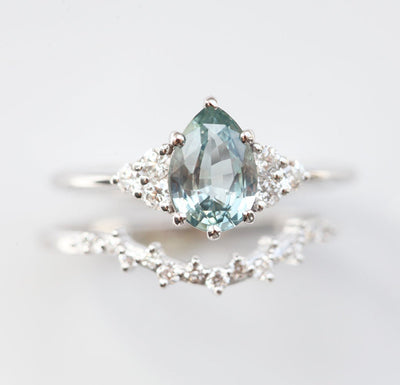 Pear-shaped mint sapphire with side diamonds