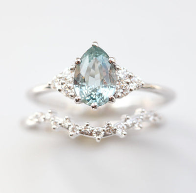 Pear-shaped mint sapphire with side diamonds