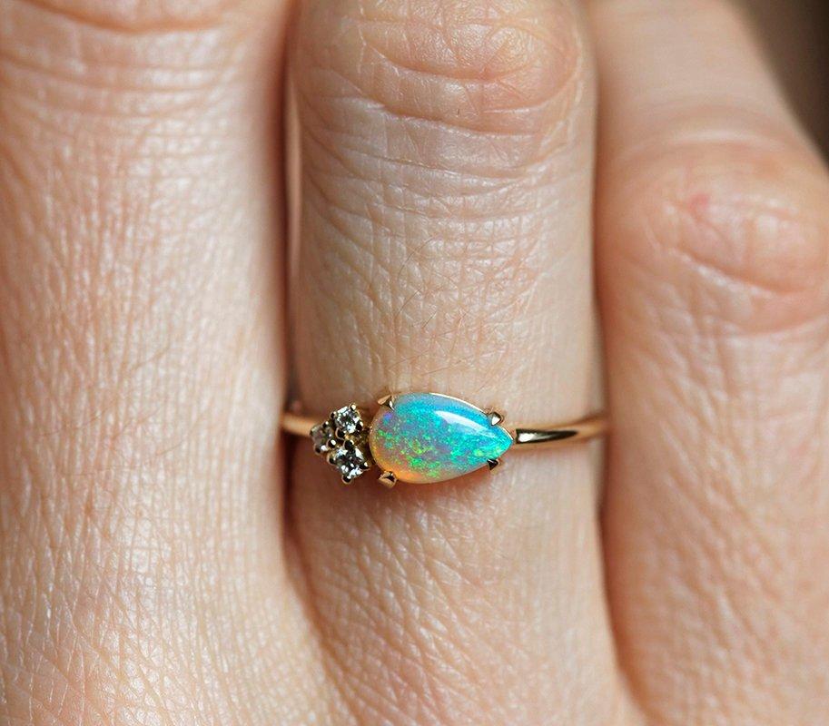 White Pear Opal Cluster Ring with 3 Side White Round Diamonds