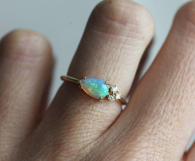 White Pear Opal Cluster Ring with 3 Side White Round Diamonds