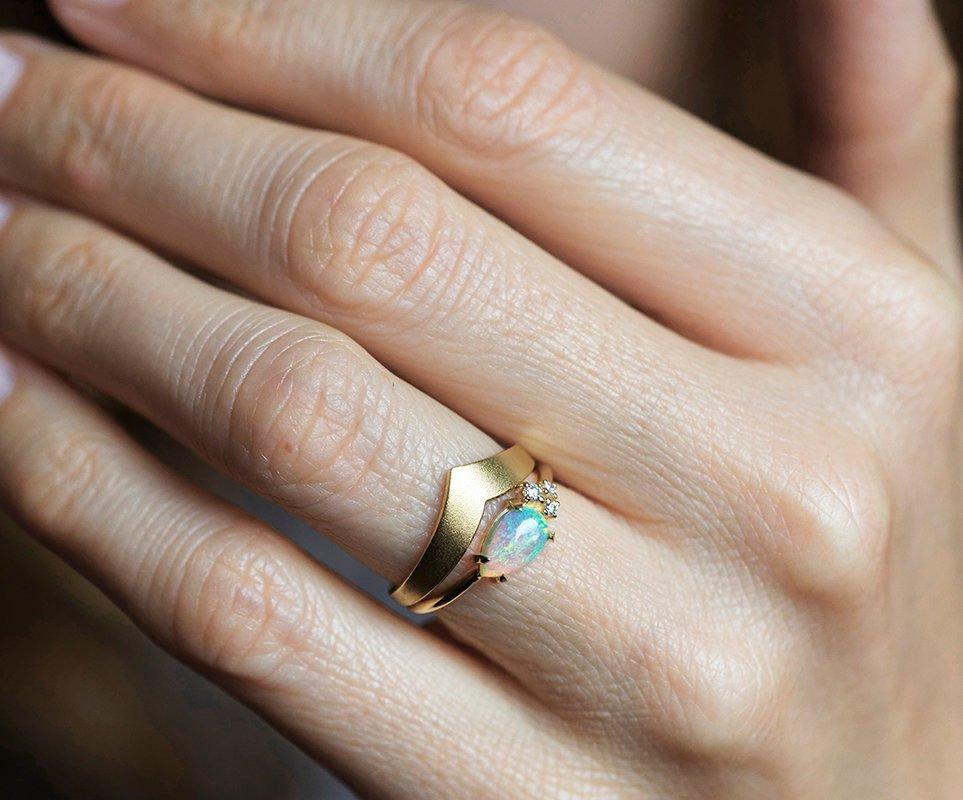 White Pear Opal Cluster Ring with 3 Side White Round Diamonds with Complementary Gold RIng