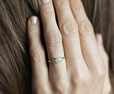 White Pear Opal Cluster Ring with 3 Side White Round Diamonds