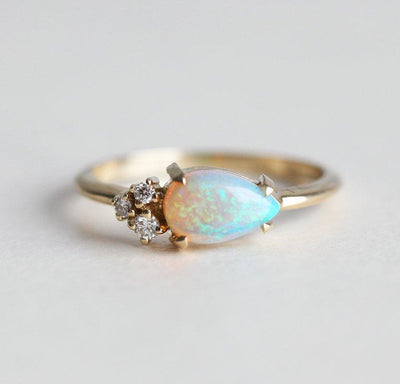 White Pear Opal Cluster Ring with 3 Side White Round Diamonds