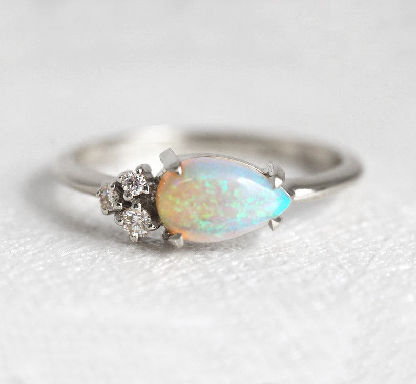 White Pear Opal Cluster Ring with 3 Side White Round Diamonds