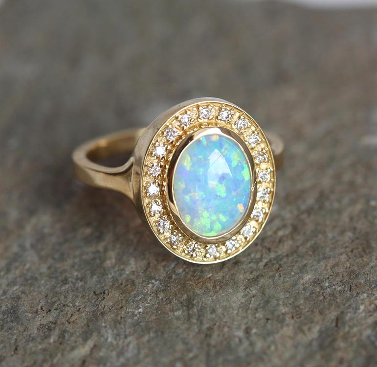 Oval Opal Halo Yellow Gold Ring with Side White Round Diamonds