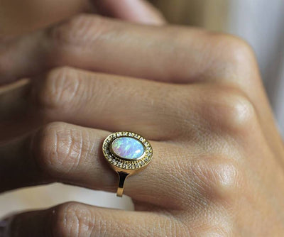 Oval Opal Halo Yellow Gold Ring with Side White Round Diamonds